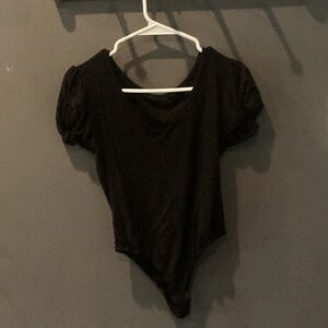 21Saints black one piece shortsleeved size small GUC